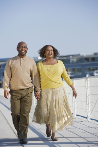 African American couple holding hands