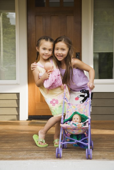 Asian sisters hugging