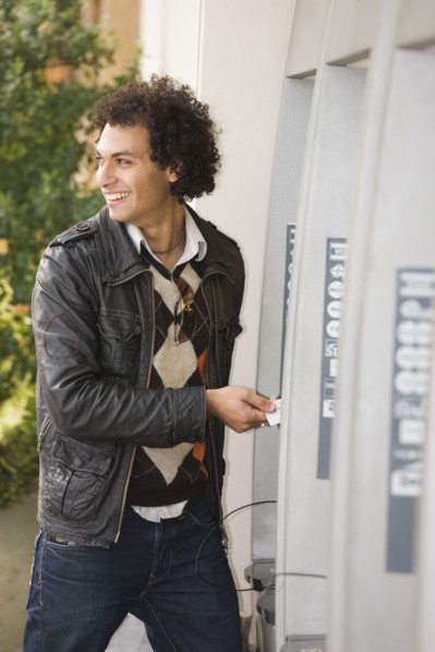 Middle Eastern man at ATM