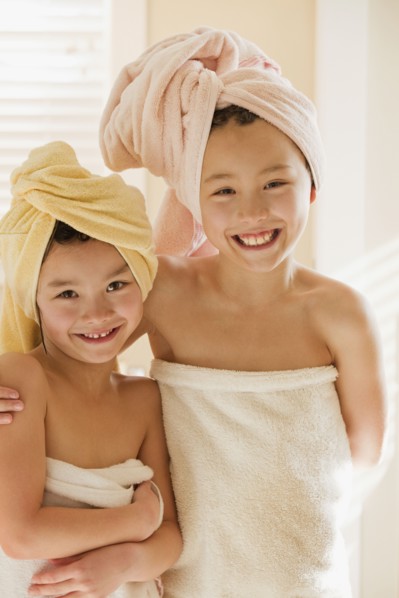 Girls wrapped in towels