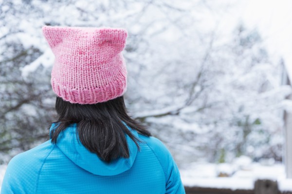 Japanese woman wearing pink hat with ears