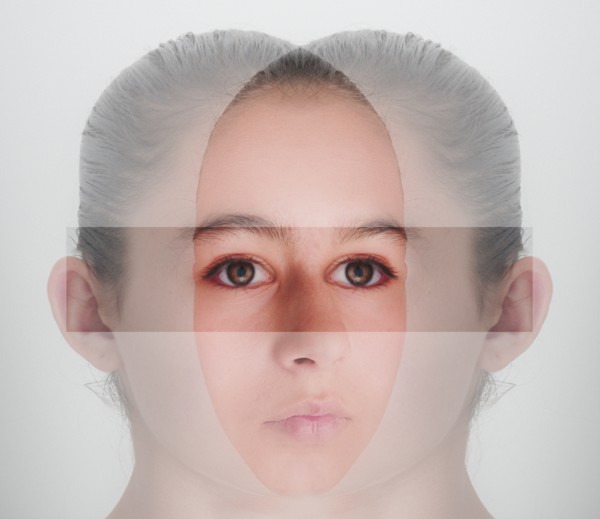 Double exposure of face of mixed race girl