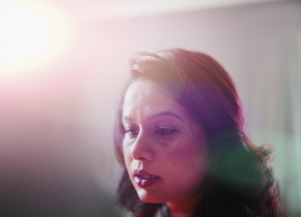Mixed race woman looking down