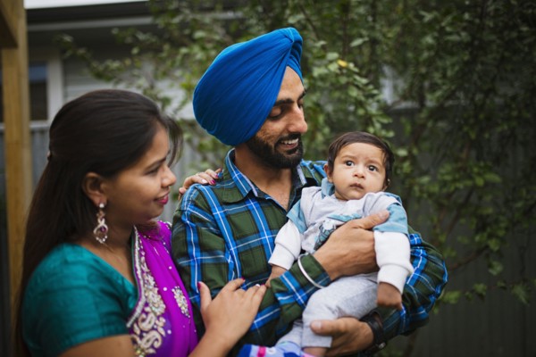 Couple admiring baby son