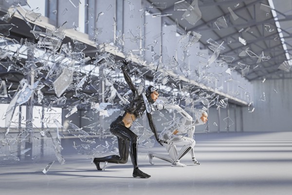 Shards of glass surrounding futuristic woman and android