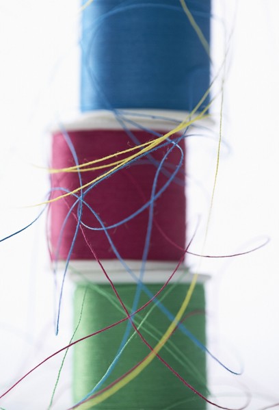 Stacks of spools of multicolor thread