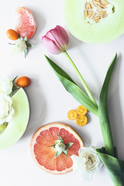 Flowers and sliced fruit