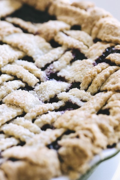 Close up of blueberry pie with lattice crust