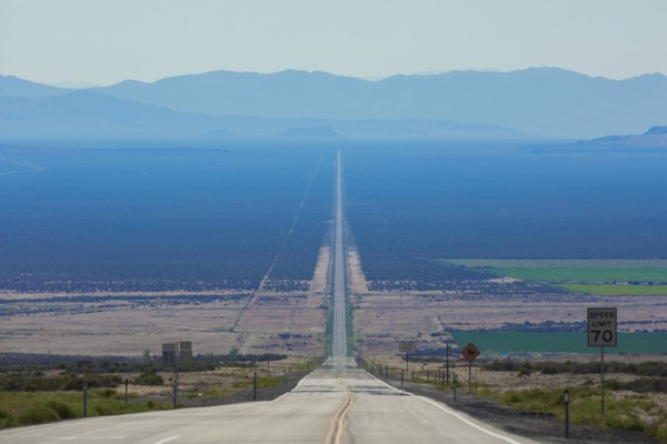 Long road through rural landscape