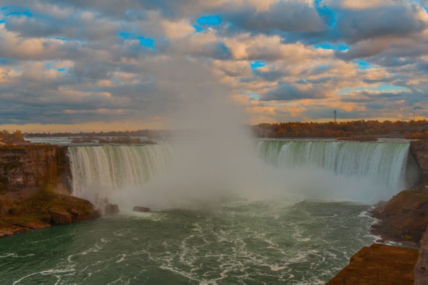 Niagara Falls mist under cloudy sky