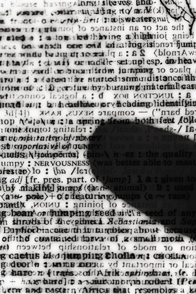 Silhouette of finger on encrypted message