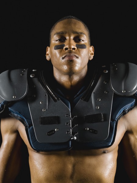 African football player wearing protective pads