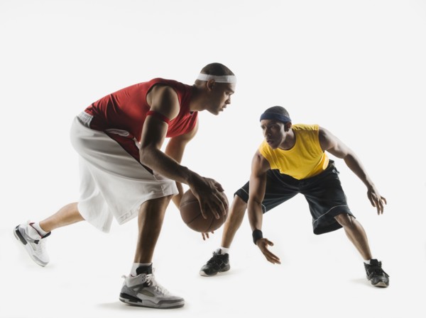 African men playing basketball