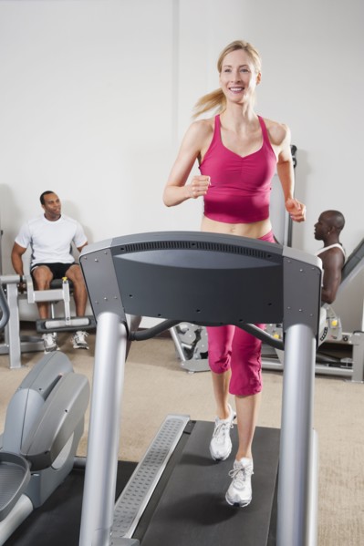 People exercising in health club