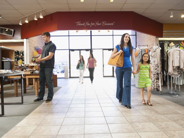 People shopping in clothing store