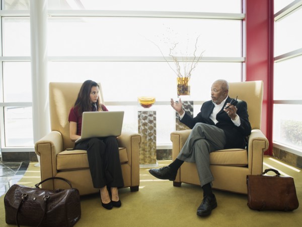Business people talking in lobby area
