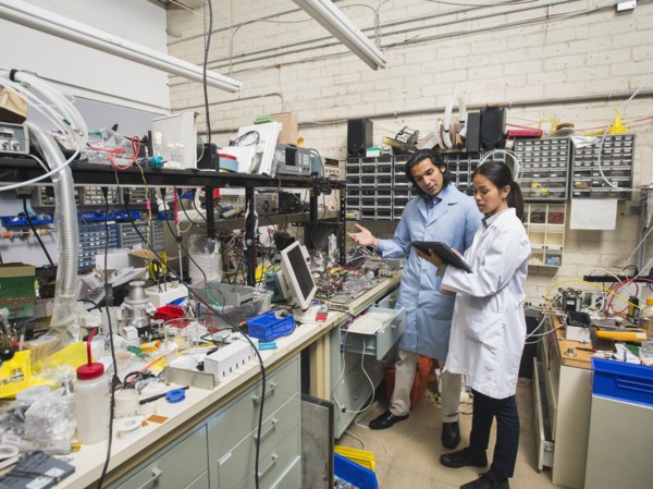 Scientists working in laboratory