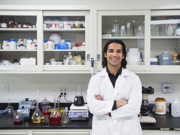 Indian scientist working in laboratory