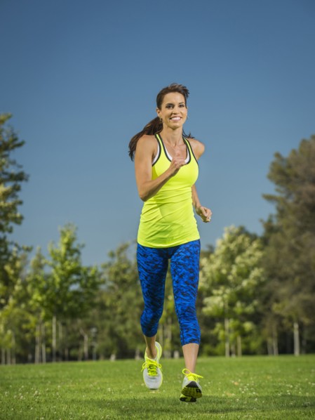Mixed race woman jogging in park