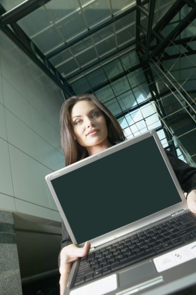 Italian businesswoman holding laptop