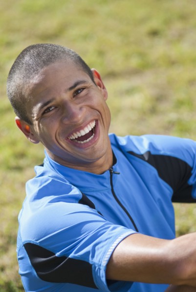 Smiling Hispanic athlete