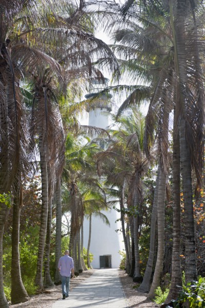 Hispanic man walking on tropical path