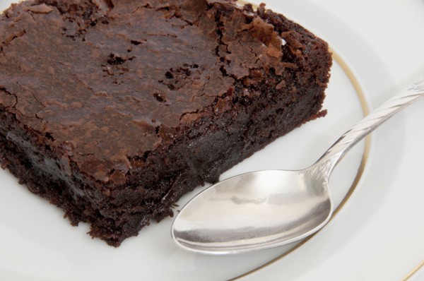 Close up of chocolate brownie and spoon