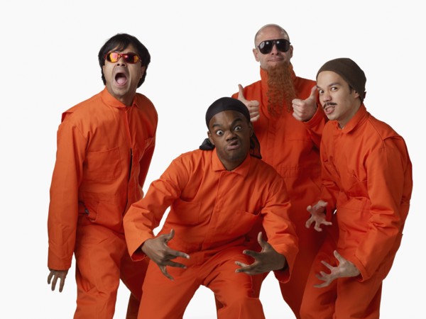 Multi-ethnic criminals in prison uniforms