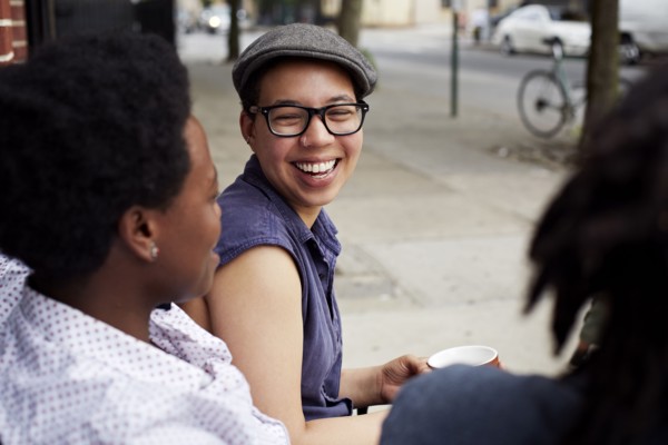 Women talking on city street