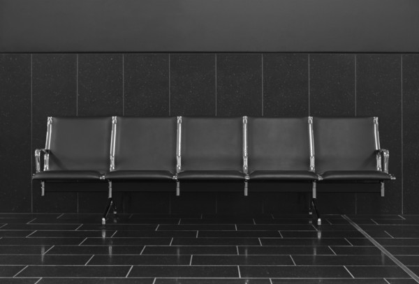 Empty seats in airport lobby