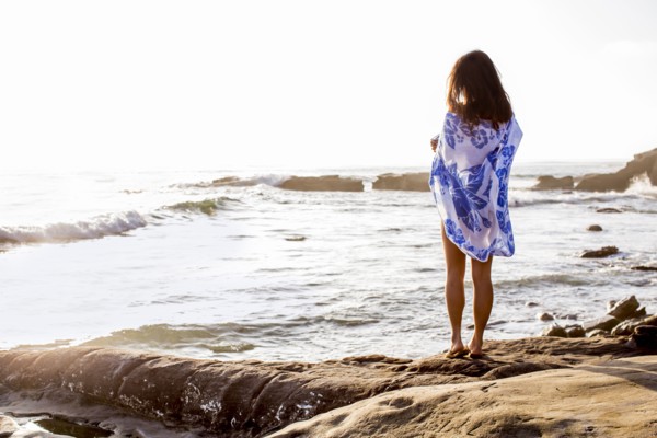 Japanese woman standing on beach