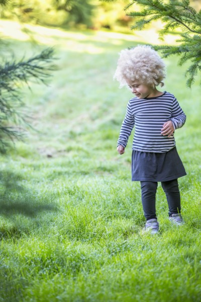 Mixed race girl walking outdoors