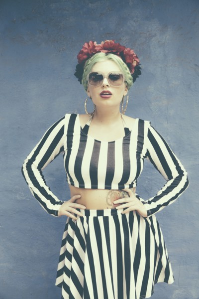 Caucasian woman wearing striped outfit
