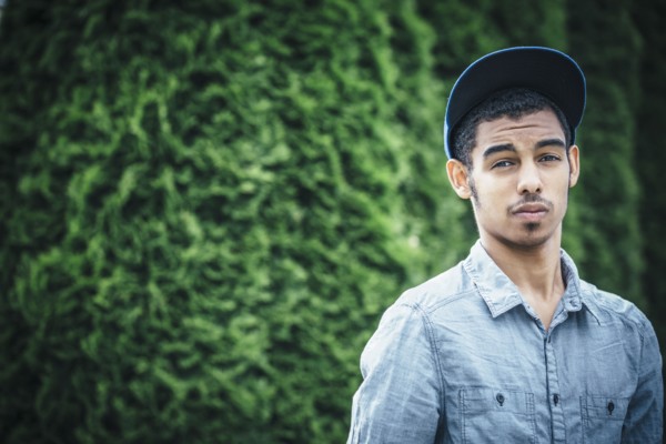 Mixed race boy standing outdoors