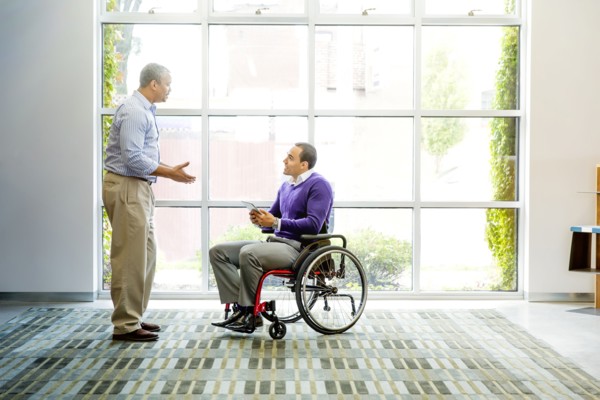 Businessmen talking in office