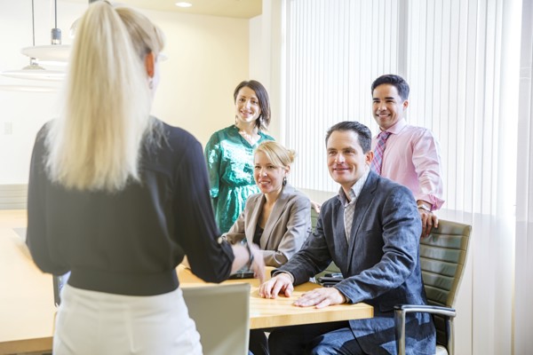 Business people talking in office meeting