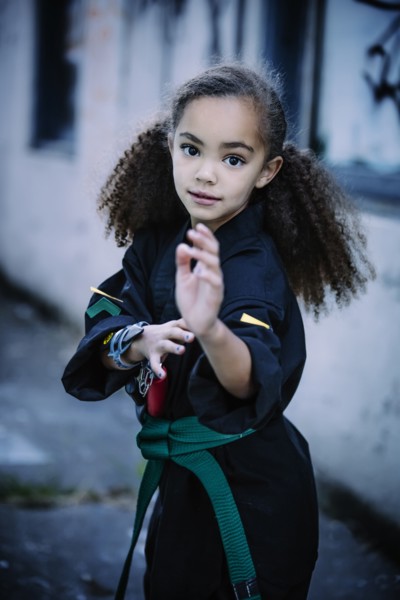 Mixed race girl practicing martial arts