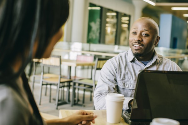 Business people working together in cafe