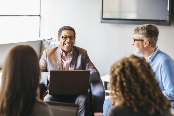 Business people talking in office meeting