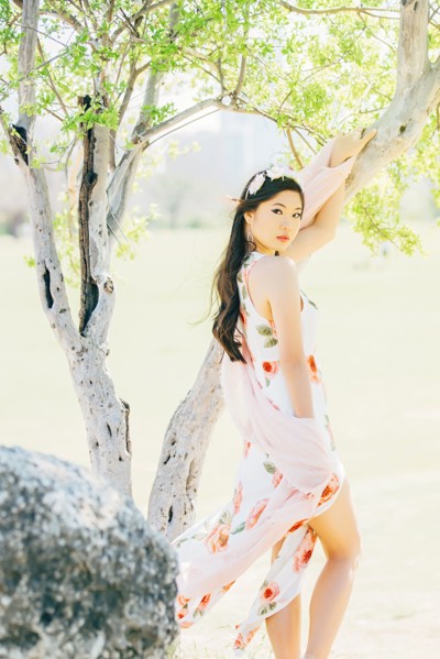 Chinese woman smiling outdoors