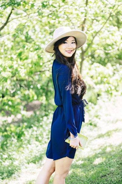 Chinese woman standing in garden