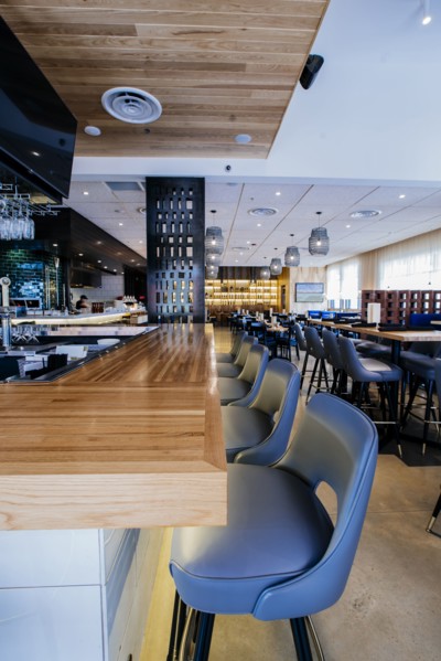 Tables and chairs in modern bar and restaurant