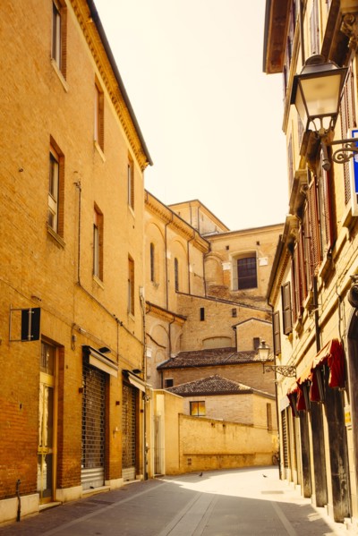 Empty street between buildings