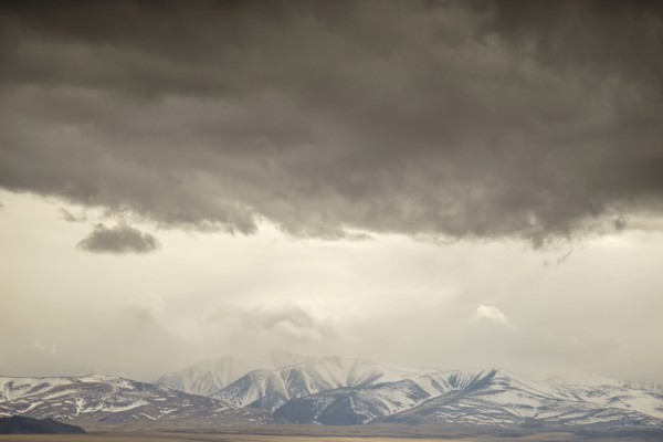 Storm clouds over mountain landscape
