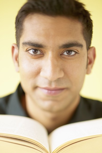 Portrait of man reading book