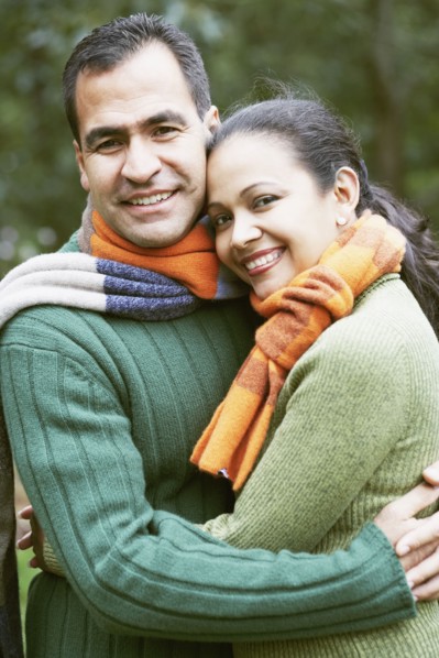 Couple hugging outdoors