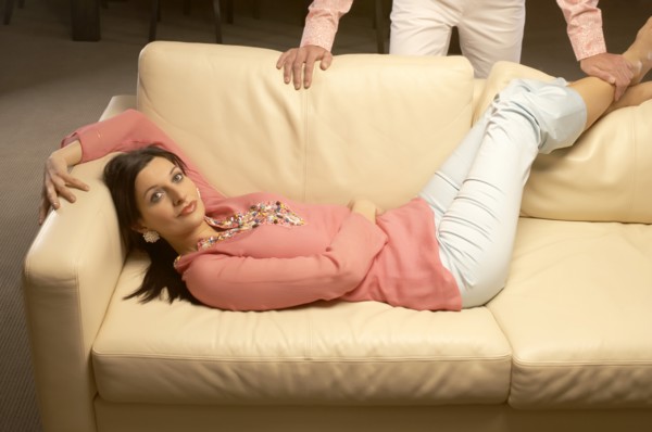 Couple relaxing in living room