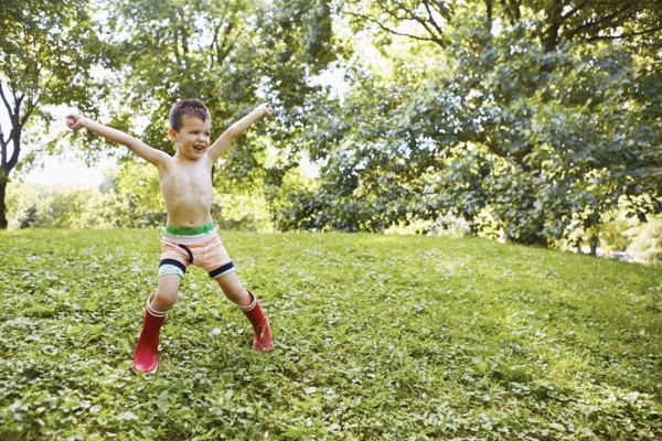 Caucasian boy playing in park