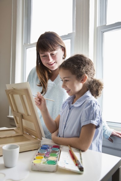 Mother and daughter painting