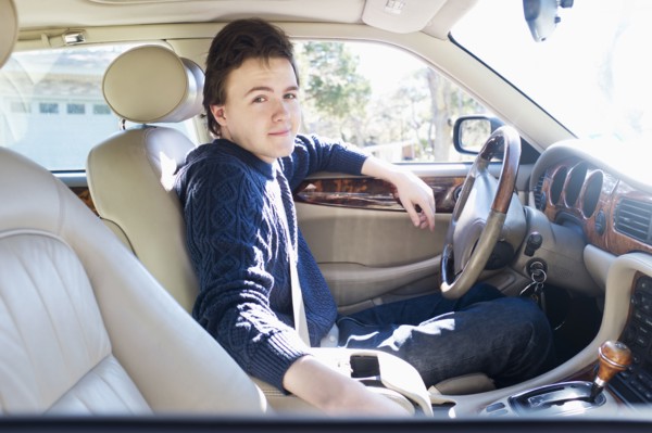 Caucasian man driving car
